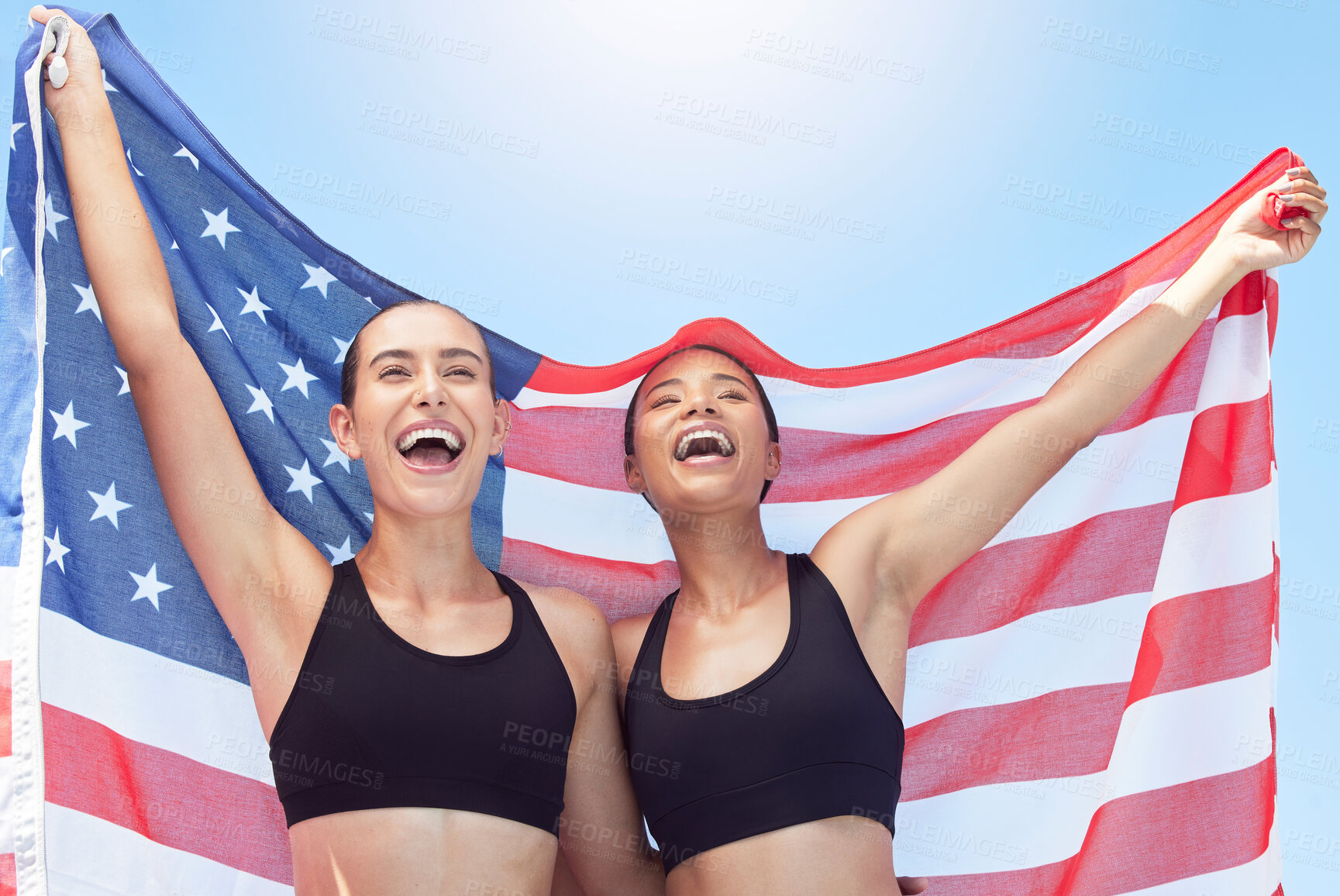 Buy stock photo USA winner, sports flag and women with support for running team, happy in collaboration at fitness event and pride in sport at stadium. Runner athlete friends with motivation for group competition