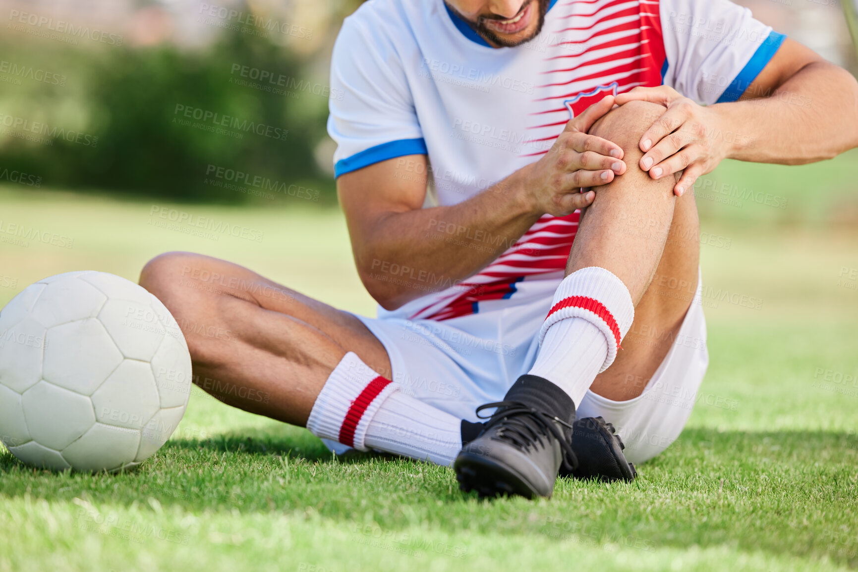 Buy stock photo Fitness, knee pain or soccer player with injury for football exercise, sports training or training on grass soccer field. Sport, soccer athlete or man on ground for health or medical workout accident