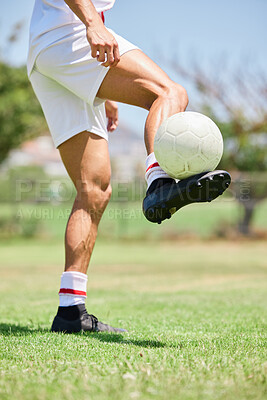 Buy stock photo Football, soccer player and balance ball on foot on a grass field, sports pitch and a park ground. Man training for soccer sport game, fitness athlete exercise and outdoor skill workout in summer sun