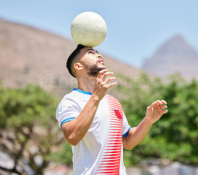 Buy stock photo Sports, soccer and man soccer player training, balance and ball, head and soccer field, practice and cardio. Football, football player and trick during fitness, workout and exercise by mexican player