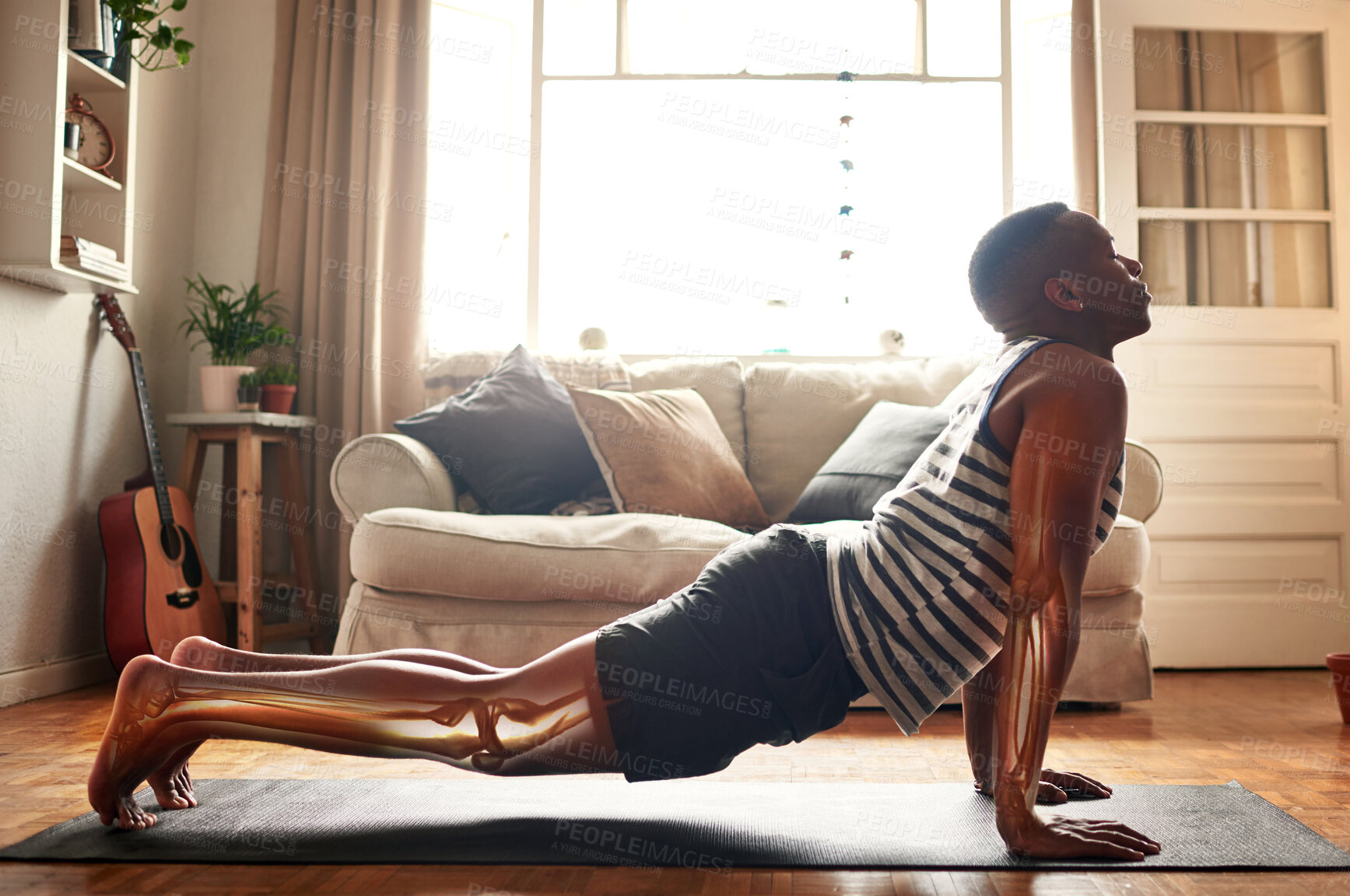 Buy stock photo Meditation, yoga and black man cobra stretching in home living room for health, wellness and flexibility. Xray, fitness and male athlete exercise, stretch and training for pilates workout in house.