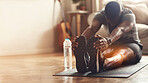 Black man, fitness and stretching legs with x ray for muscle wellness, yoga or exercise on floor at home. Active African American male in warm up leg stretch on mat for exercising workout on mockup