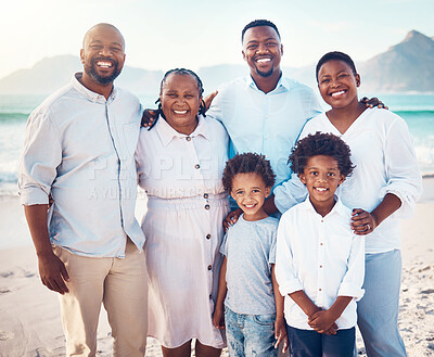 Buy stock photo Happy, smile and portrait of black family at beach for travel, summer break and bonding on vacation. Relax, holiday trip and generations with parents and children for quality time, sunshine and fun