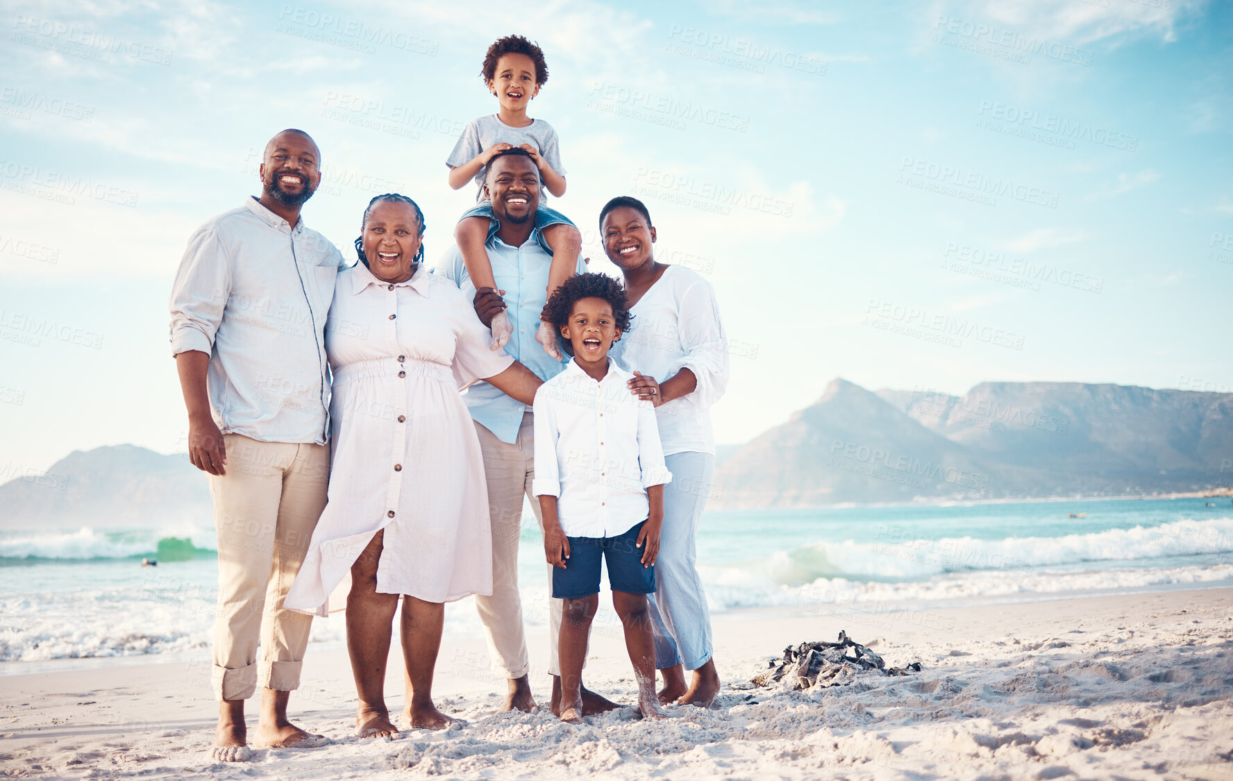 Buy stock photo Happy, travel and portrait of black family at beach for smile, summer break and bonding on vacation. Relax, holiday trip and generations with parents and children for quality time, sunshine and fun