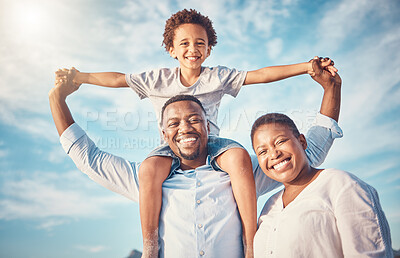 Buy stock photo Portrait, black family and happy parents playing with kid or child outdoors on vacation or holiday and bonding together. Mother and father carrying son on shoulders with smile, excited and happiness