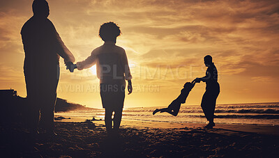 Buy stock photo Silhouette, family and on beach for holiday, quality time and happiness on sand, weekend break and cheerful. Love, parents and children on summer vacation, sunset or bonding together, loving or relax