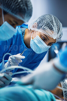 Buy stock photo Medical tools, theatre and doctors or woman for hospital support, teamwork and emergency healthcare with focus. Surgery, nurses and surgeon in face mask, patient check and tweezer in operating room
