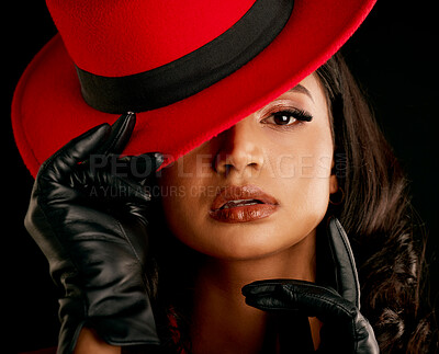 Buy stock photo Elegant female, portrait and hidden face with makeup in india with glamour in studio background. Cosmetics, beauty and red hat with elegant woman with vintage or designer outfit with class or retro.