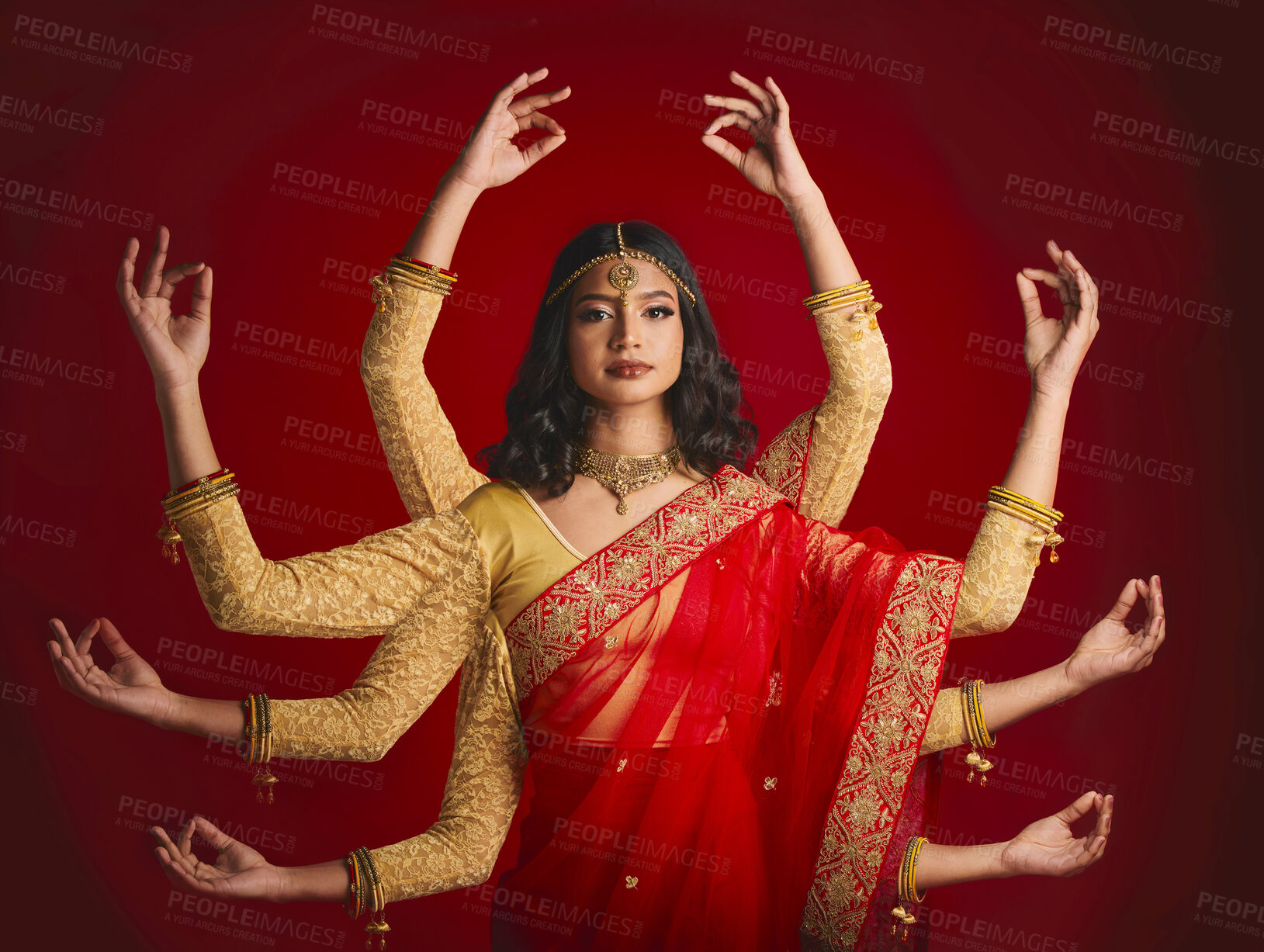 Buy stock photo Indian woman, portrait and goddess with many hands in studio background with sari and jewellery. Mudra, girl and beauty face with meditation with dress or movement with culture or spirituality.