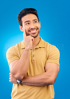 Buy stock photo Thinking, studio or man brainstorming, smile or happy for memory, inspiration plan or solution ideas. Planning, remember or Asian person wondering about thought, decision or choice on blue background