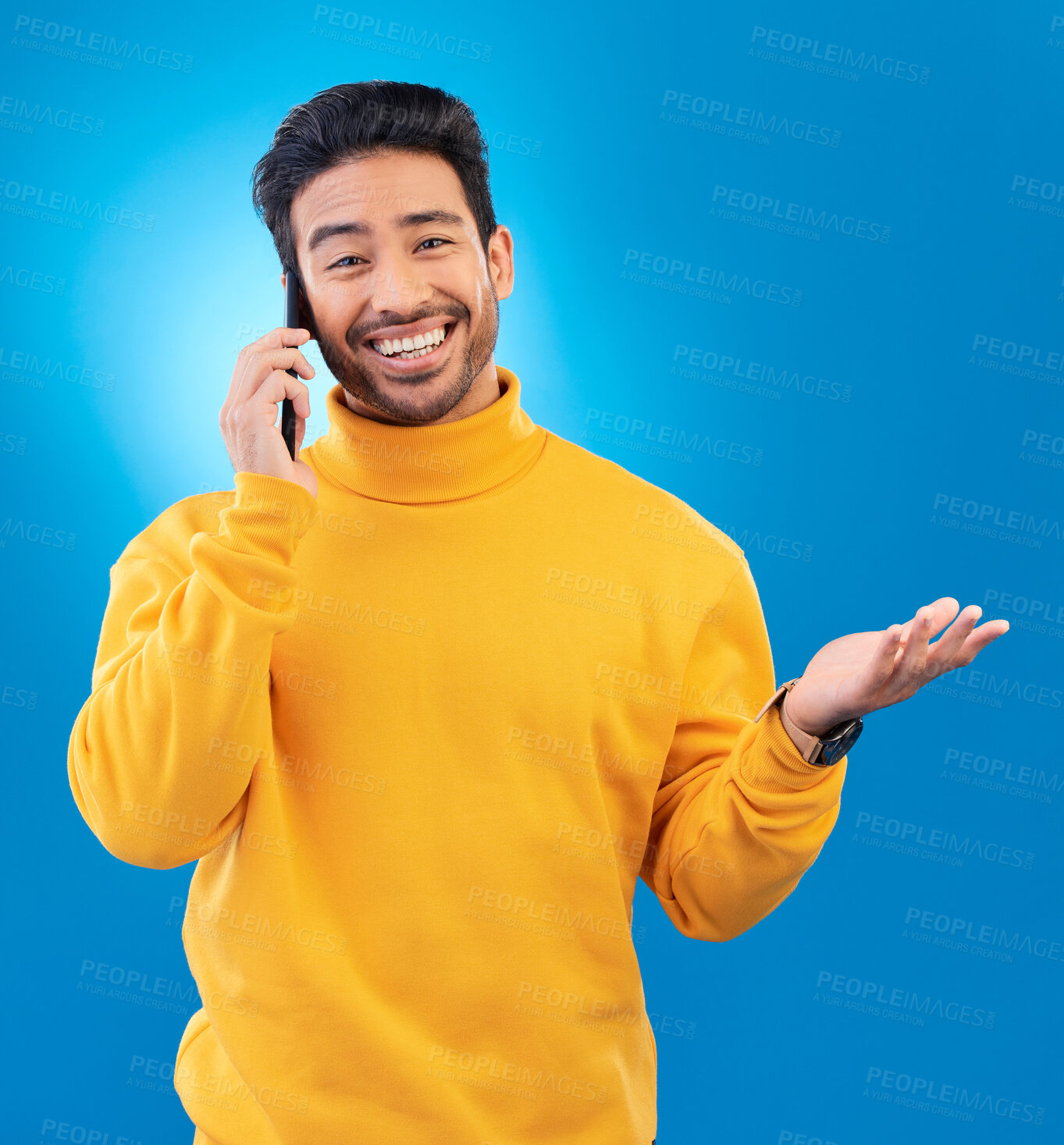 Buy stock photo Happy, conversation and portrait of an Asian man on a phone call for communication and networking. Smile, technology and a person speaking on a mobile isolated on a blue background in a studio