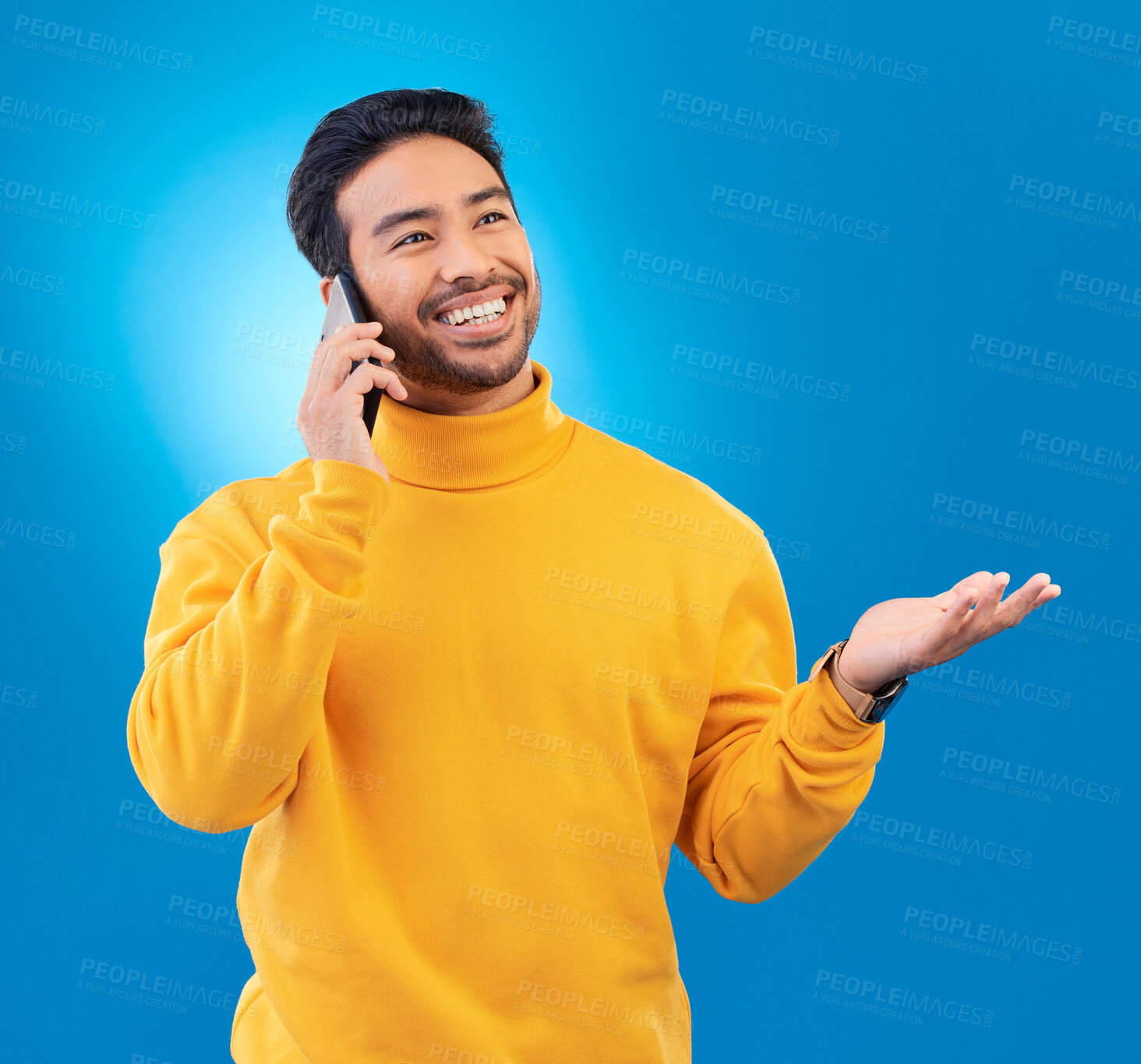 Buy stock photo Technology, man and smartphone against a blue background and happy for networking. Discussion or online communication, connectivity or conversation and male person on a phone call against backdrop