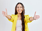 Portrait, welcome or arms outstretched with happy woman on a white background in studio for a friendly hug. Smile, love or hello with a girl reaching hands to offer a greeting or congratulations 