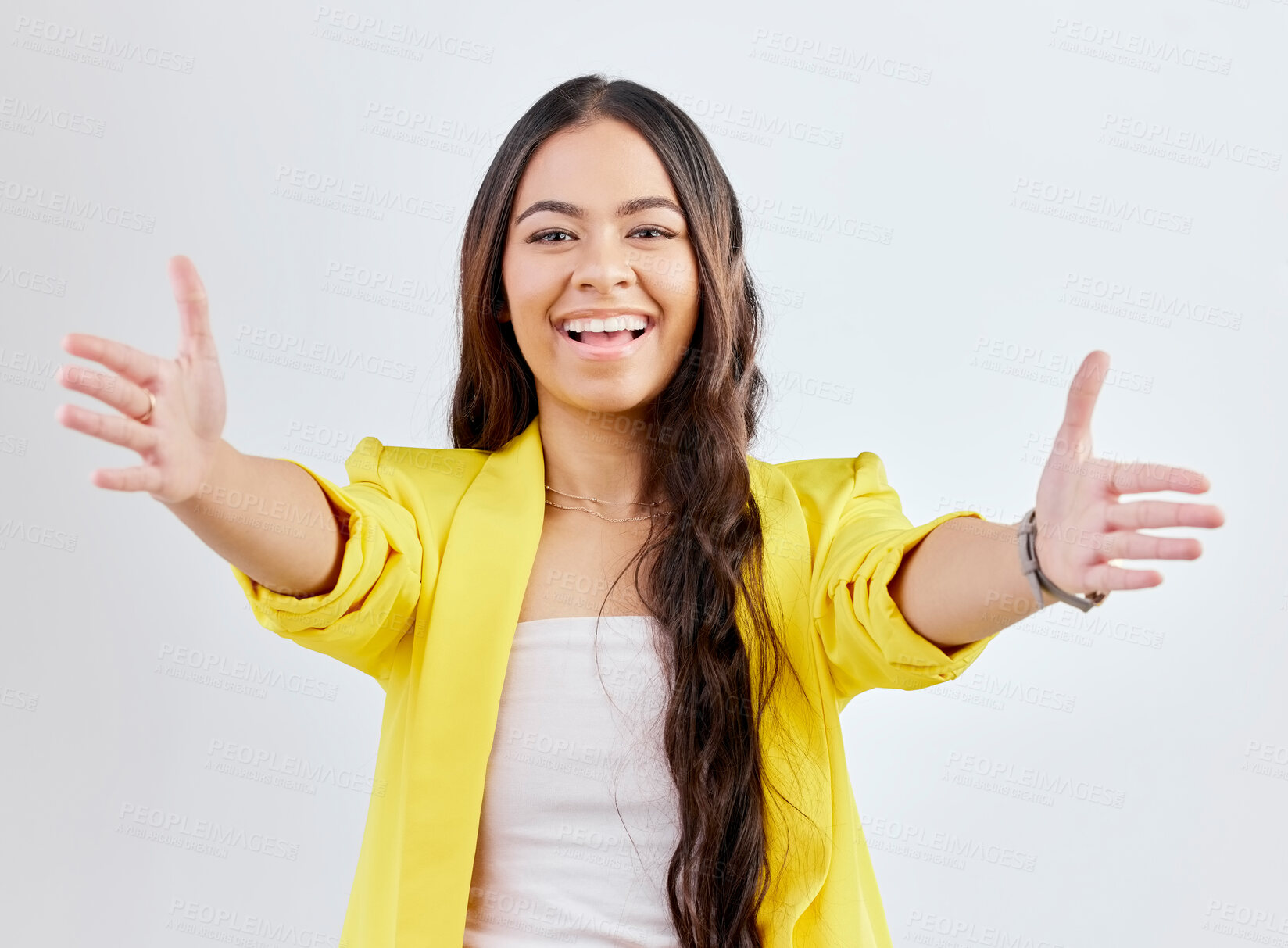 Buy stock photo Portrait, welcome or arms outstretched with happy woman on a white background in studio for a friendly hug. Smile, love or hello with a girl reaching hands to offer a greeting or congratulations 