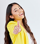 Portrait, support and woman with thumbs up, achievement and like symbol against a white studio background. Winning, female person or model with hand gesture, sign and positive with like and agreement