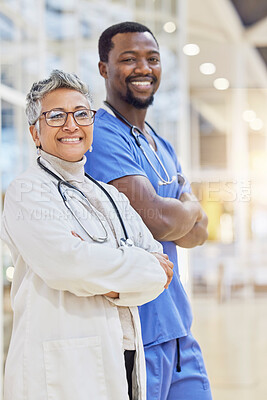Buy stock photo Doctor, together and portrait with cross arm and smile at hospital with medicine. Healthcare professional, team and senior female and man at clinic for support with collaboration for help or service.