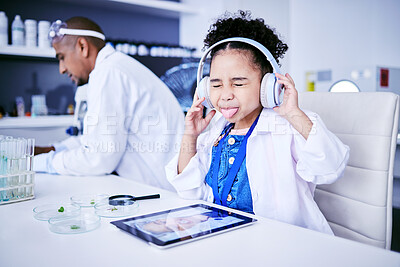 Buy stock photo Crazy, lab and child with music and tablet for science with a father or scientist for work or learning. Funny, future and a comic girl streaming audio on tech with a person for innovation in medicine