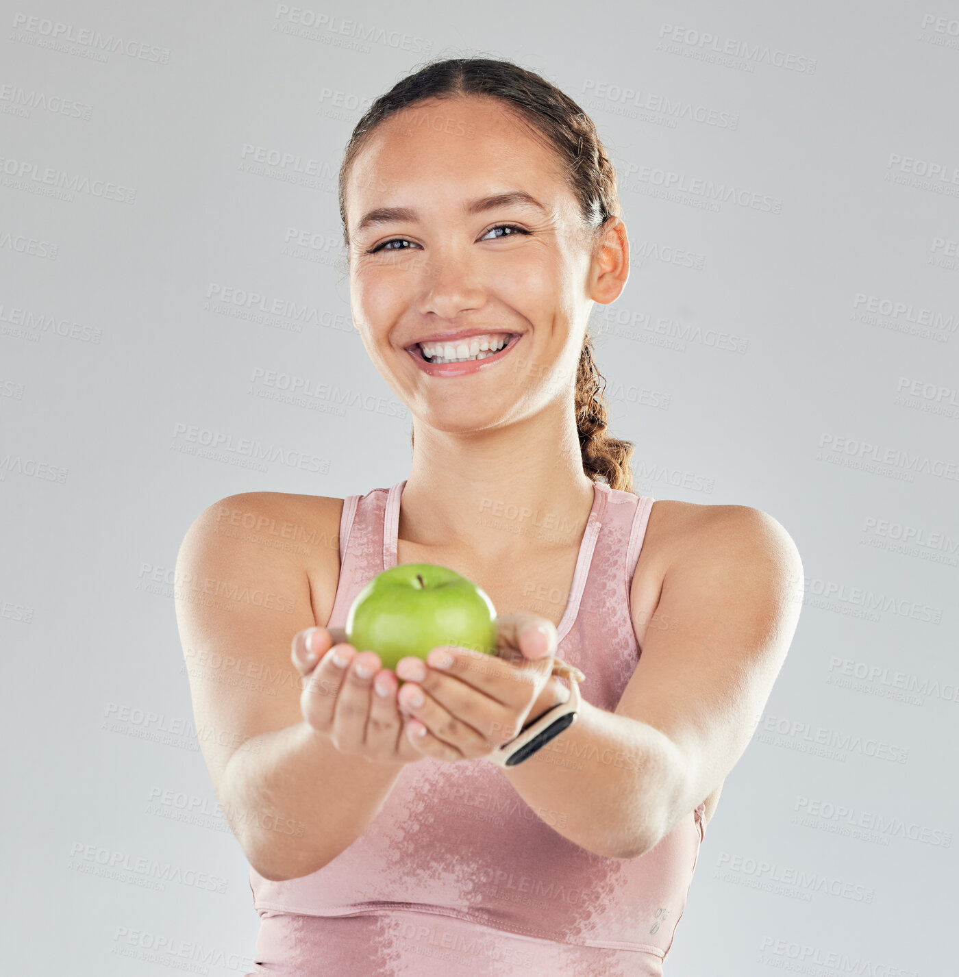 Buy stock photo Portrait, apple and offer of woman isolated on studio, white background for healthy food, healthcare or nutritionist diet. Face of vegan person or model giving green fruit for detox, care and choice