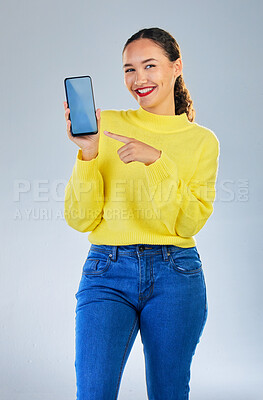 Buy stock photo Phone screen, mockup and portrait of woman or student in university presentation, website or registration information. Happy person, mobile space of college, contact or ux design on studio background