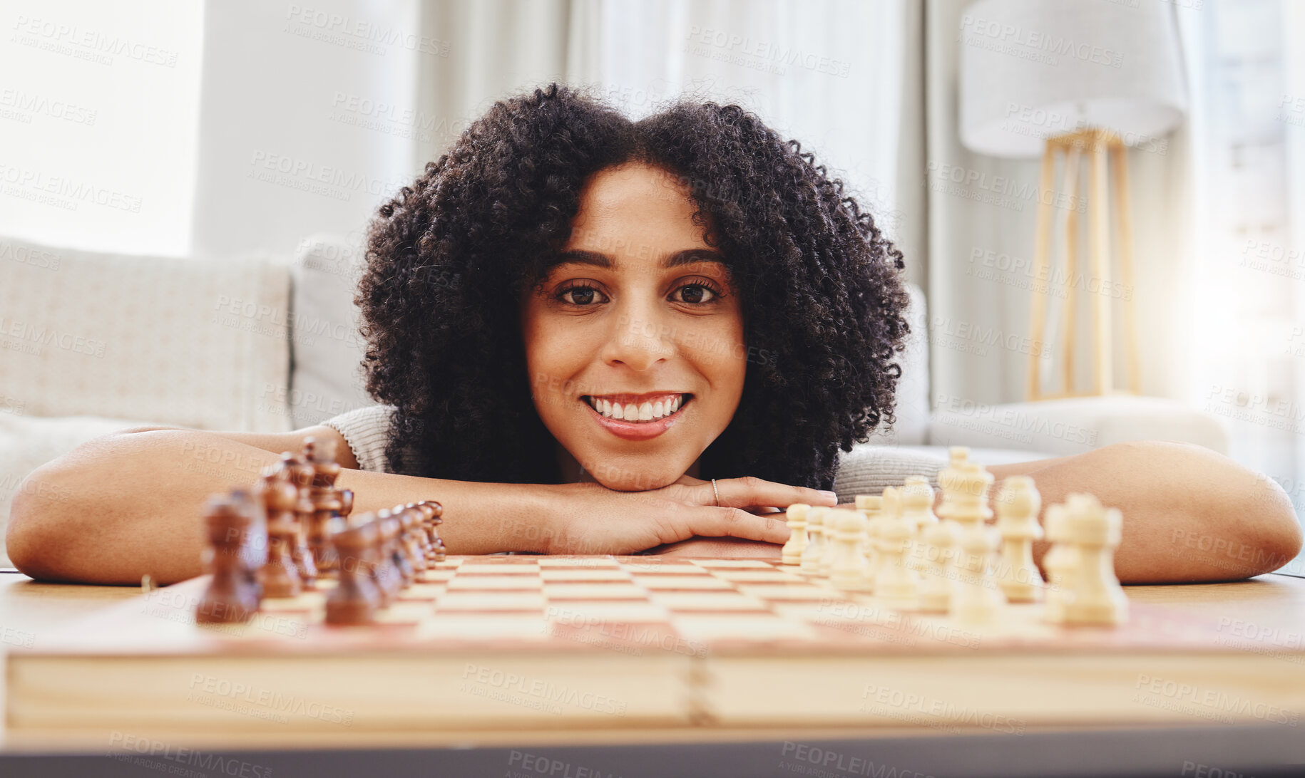 Buy stock photo Chess, game and portrait of woman with board for strategy, thinking and challenge at home. Competition, winning and female person with chessboard in living room ready for playing and problem solving