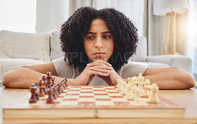 Buy stock photo Chess, thinking and face of woman with game for strategy, problem solving and challenge at home. Competition, planning move and female person with chessboard in living room ready for playing games