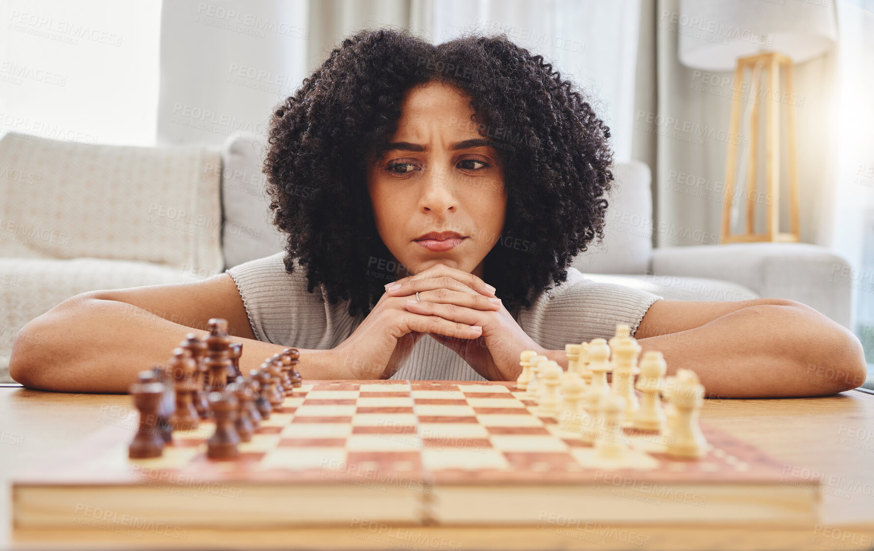 Buy stock photo Chess, thinking and face of woman with game for strategy, problem solving and challenge at home. Competition, planning move and female person with chessboard in living room ready for playing games