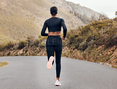 Buy stock photo Fitness, running and back with black woman in nature for health, workout and challenge. Performance, sports and exercise with female runner training on mountain road for speed, marathon and wellness