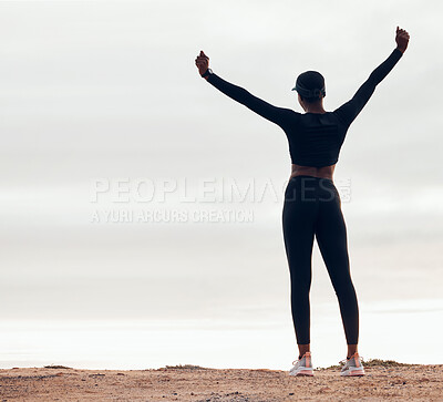 Celebration, fitness and back of woman in nature with achievement, success and goals for workout Sports, freedom and happy female person with hands in air for exercise, training and running target