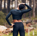 Stretching neck, fitness and back of woman in nature for exercise, training and sports in forest. Flexibility, mountain and female person stretch body for warm up, workout and wellness for health