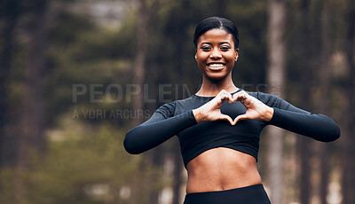 Buy stock photo Heart hand, black woman and fitness in nature with exercise and fitness with love gesture. Sport, female person and support outdoor by the trees after a run with romance sign from a workout in park 