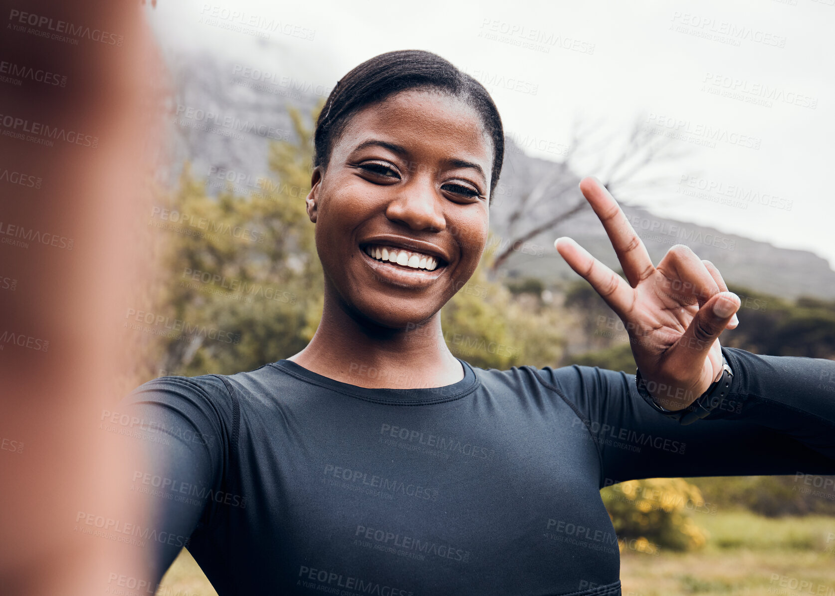 Buy stock photo Fitness, black woman and taking selfie in forest for workout with peace sign. Training or exercise, health wellness or motivation and happy female athlete with hand emoji for social media in woods