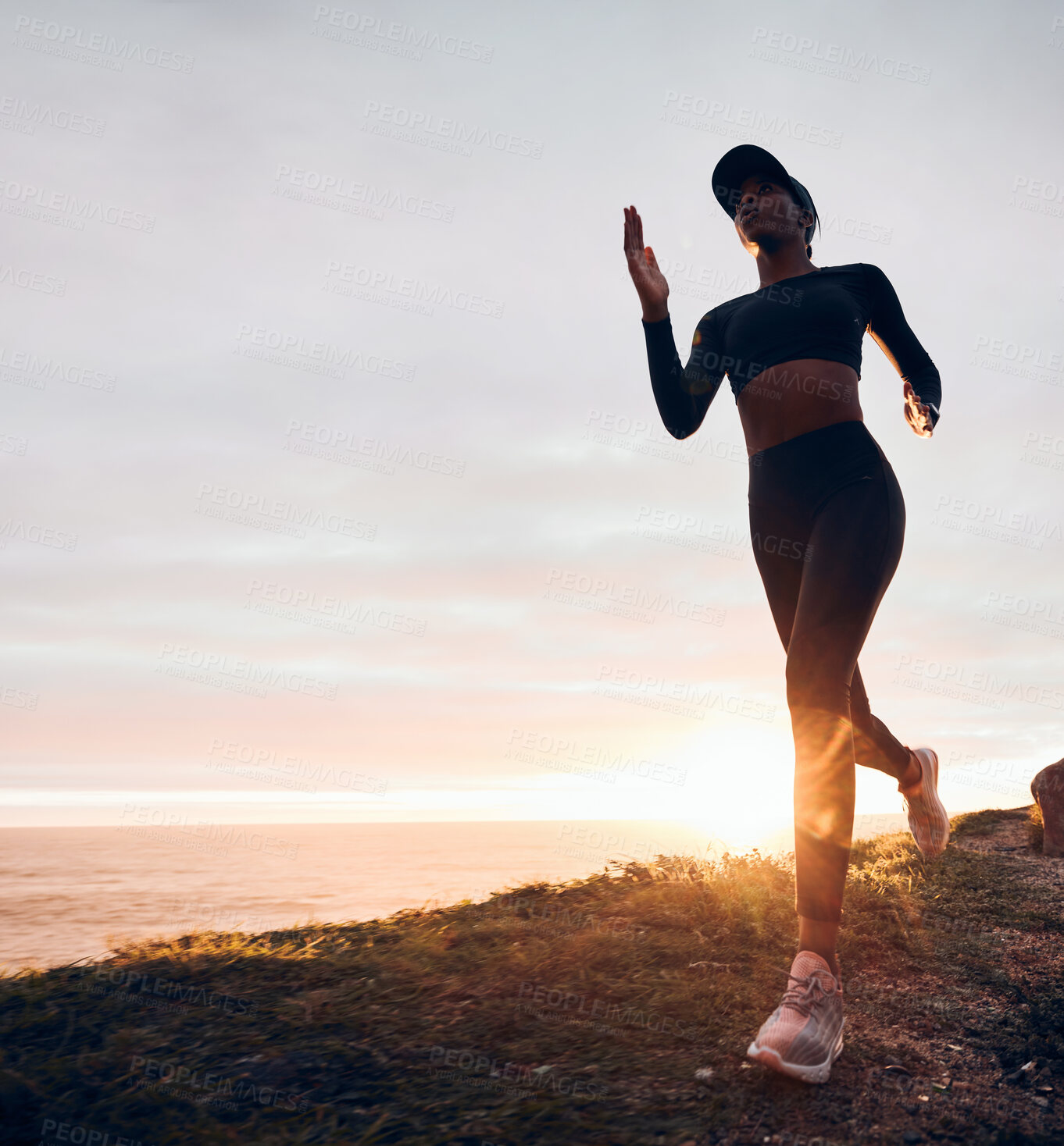 Buy stock photo Running, sunrise and woman on mountain by ocean for exercise, marathon training and fitness. Sports, mockup space and female person in nature for warm up, cardio workout and body wellness in morning
