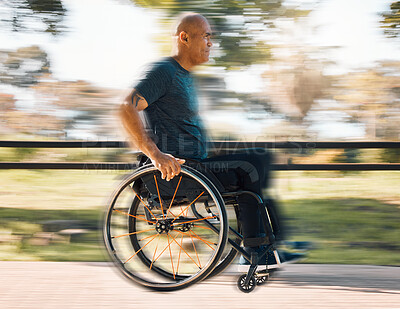 Buy stock photo Man with a disability, wheelchair and motion of exercise in the park, nature or athlete in outdoor fitness training. Blurred background, sport and disabled person exercising or speed on wheels