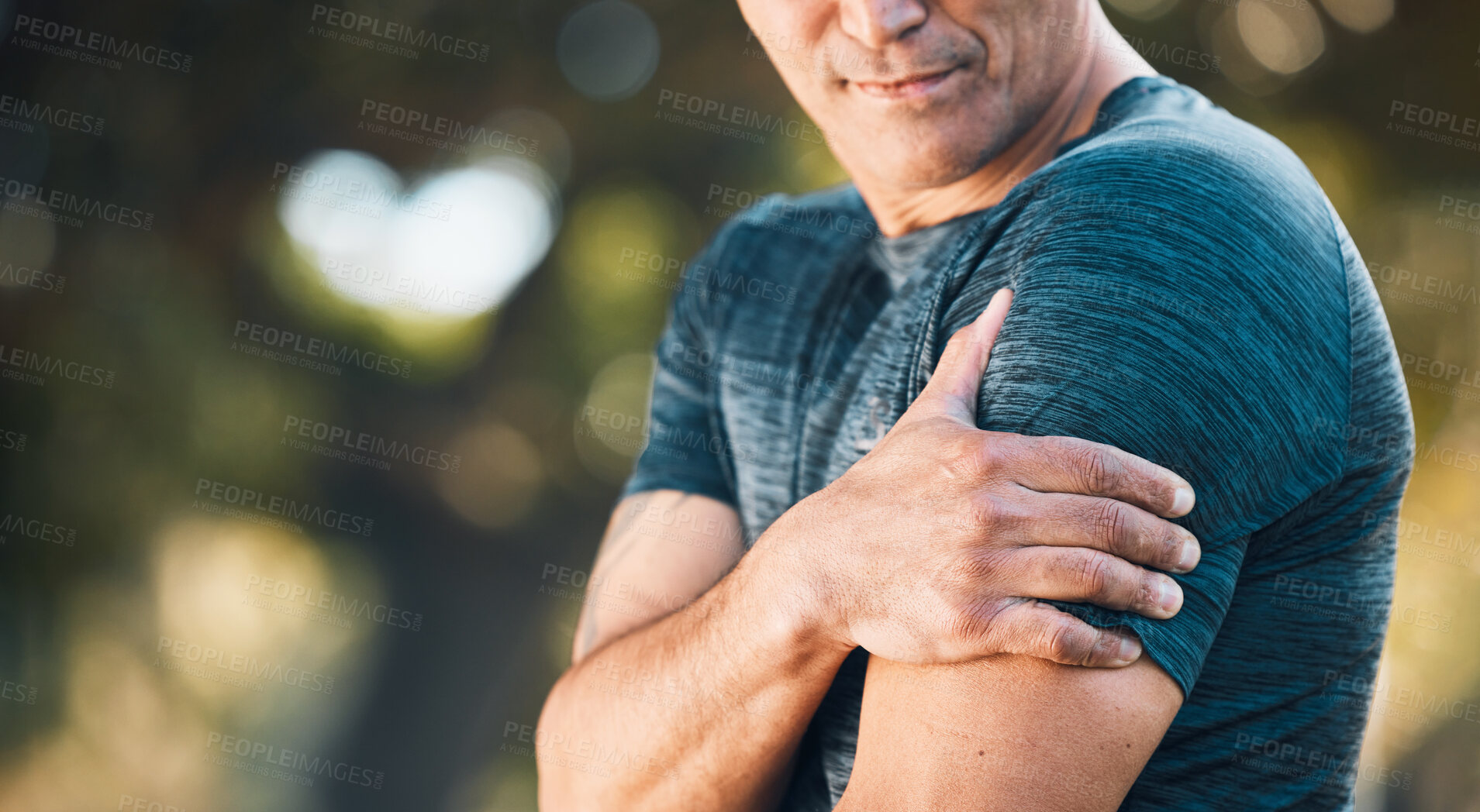 Buy stock photo Arm pain, outdoor and man in a park with sport injury and muscle strain from fitness and workout. Exercise problem, male person and back with medical, health and problem from training accident 