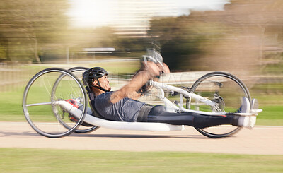 Buy stock photo Cycling, speed and man with disability in race training for competition with action, motivation and exercise on bike. Energy, workout and person on recumbent bicycle on fast outdoor track challenge.