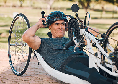 Buy stock photo Sports, athlete or a man with a disability and bike for handicap race, fitness and recumbent challenge. Exercise, happy and a handbike of Paralympic person outdoor for cycling or cardio for training