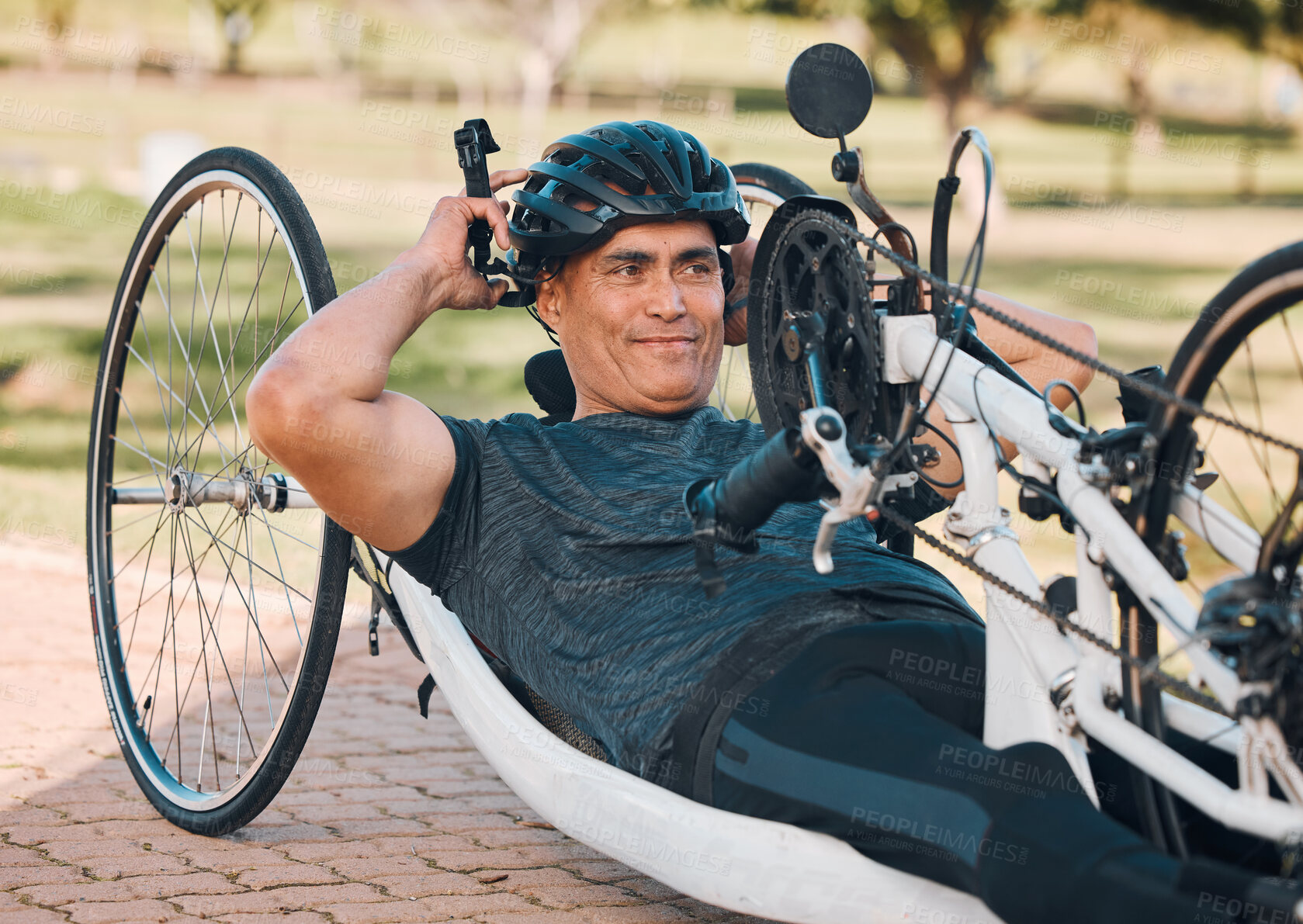 Buy stock photo Sports, athlete or a man with a disability and bike for handicap race, fitness and recumbent challenge. Exercise, happy and a handbike of Paralympic person outdoor for cycling or cardio for training