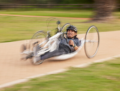 Buy stock photo Fast, disability and fitness with man and bike with handicap for training, sports and challenge. Exercise, workout and wheelchair with disabled person cycling in park for cardio, wellness and health
