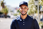 Happy, delivery and portrait of a man in the city for courier work and ecommerce job. Smile, retail and a headshot of a male service worker in the shipment industry and in town while working