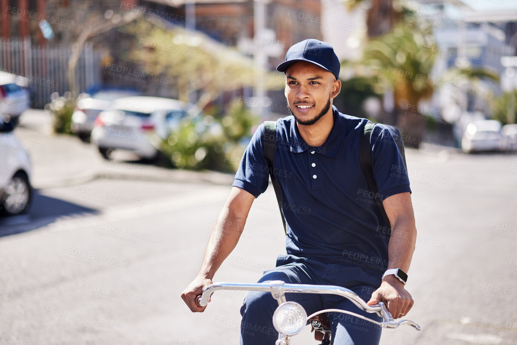 Buy stock photo Bicycle, delivery and city, man in street with smile and carbon neutral transport service with backpack. Happiness, eco friendly urban distribution and bike courier on road for sustainable logistics.