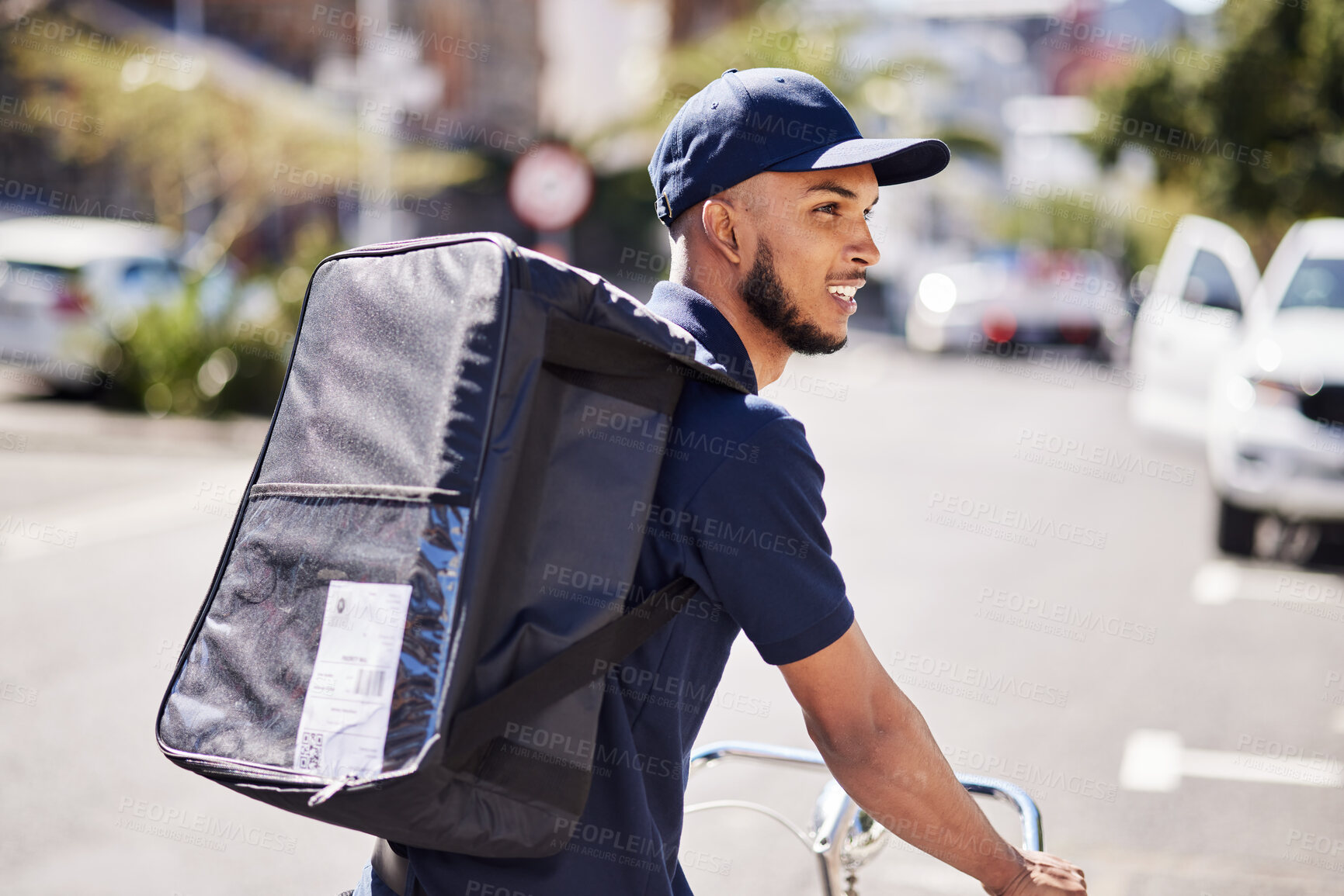 Buy stock photo Man, bicycle and delivery in city with bag of logistics, distribution service and fast food order. Courier, eco friendly transport or deliveryman travel on bike with ecommerce product in urban street