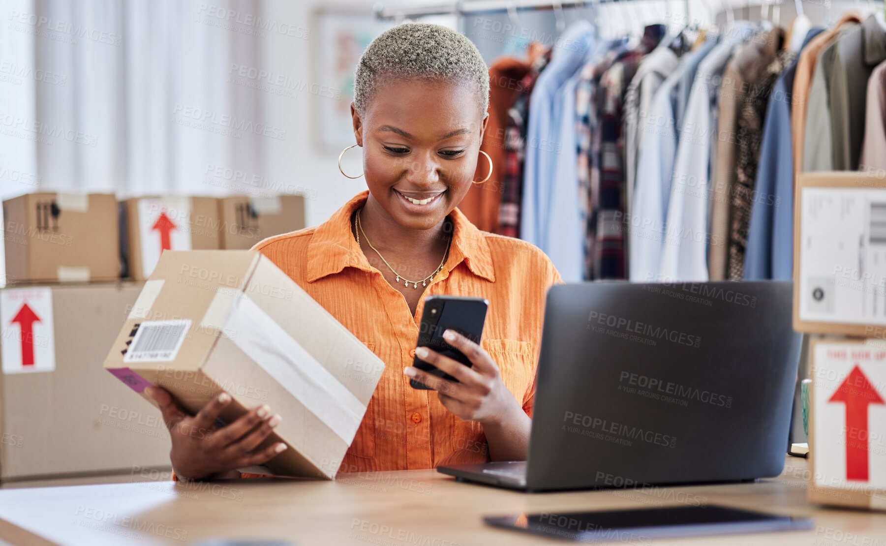 Buy stock photo Black woman, phone and logistics of fashion designer for communication, sale or order at boutique store. Happy African female person or small business owner on smartphone for clothing payment at shop