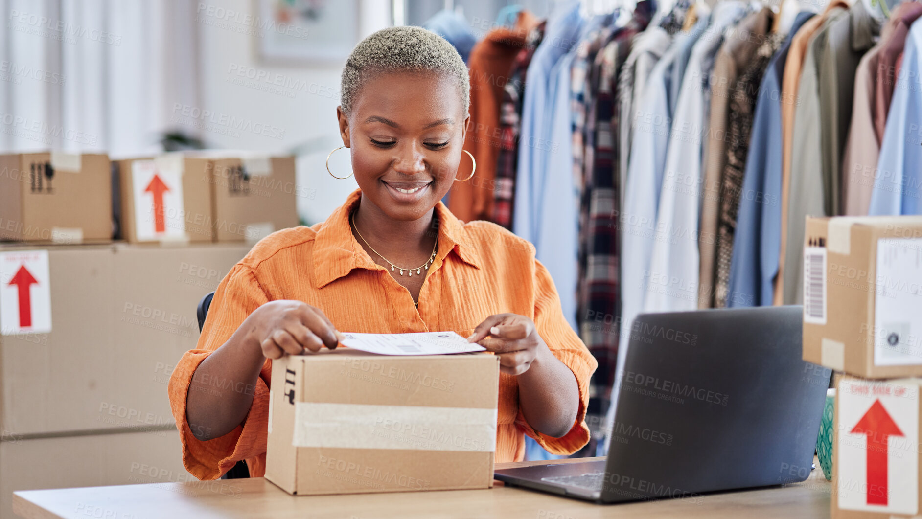 Buy stock photo Black woman, fashion designer and label box in small business for courier service or delivery at boutique. Happy African female person packing parcel for order, payment or purchase in clothing store