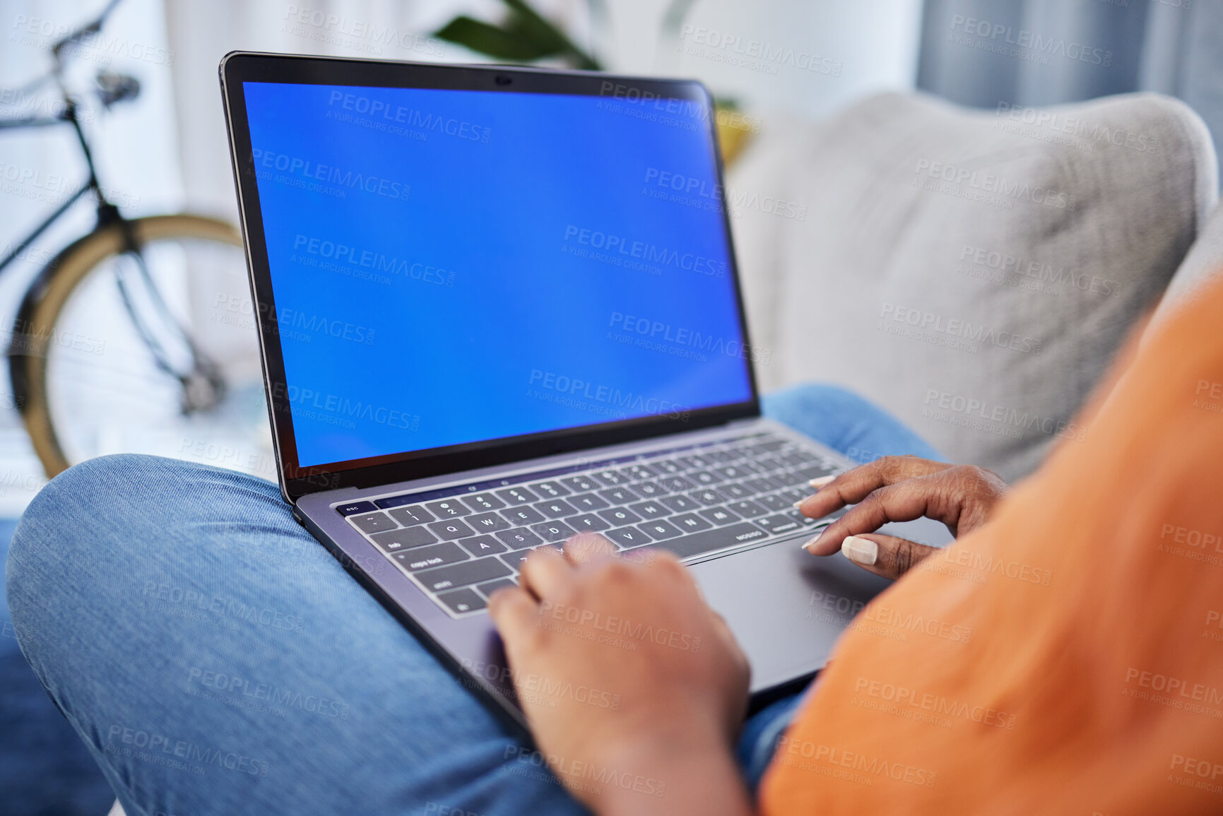 Buy stock photo Woman, hands and laptop with mockup screen for communication, research or advertising at home. Hand of female person on computer display or chromakey for online browsing on living room sofa in house