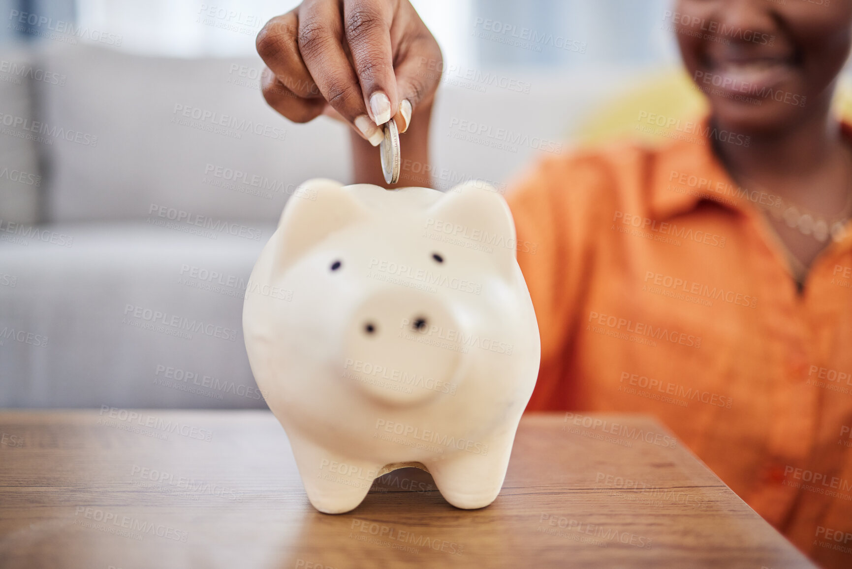 Buy stock photo Woman, hands and coin in piggy bank for investment, finance or money savings on table at home. Hand of female person with piggybank for financial freedom, cash growth or budget planning in the house