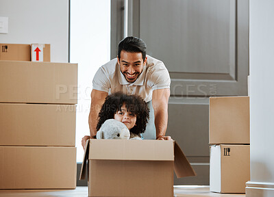 Buy stock photo Father, child and fun with box while moving to new home, real estate and property of house. Happy dad, kid and ride in cardboard while packing, playing games and celebration of relocation or freedom