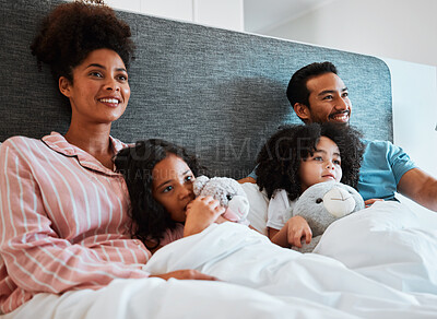 Buy stock photo Bed, home and relax happy family watching tv show, subscription movie or streaming entertainment film. Bonding, morning love or bedroom people watch television, media or cartoon video in apartment