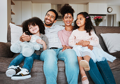 Buy stock photo Mother, father and kids on sofa, watching tv and happy family bonding together in living room. Smile, happiness and parents relax with kids on couch, streaming television show subscription or movies.