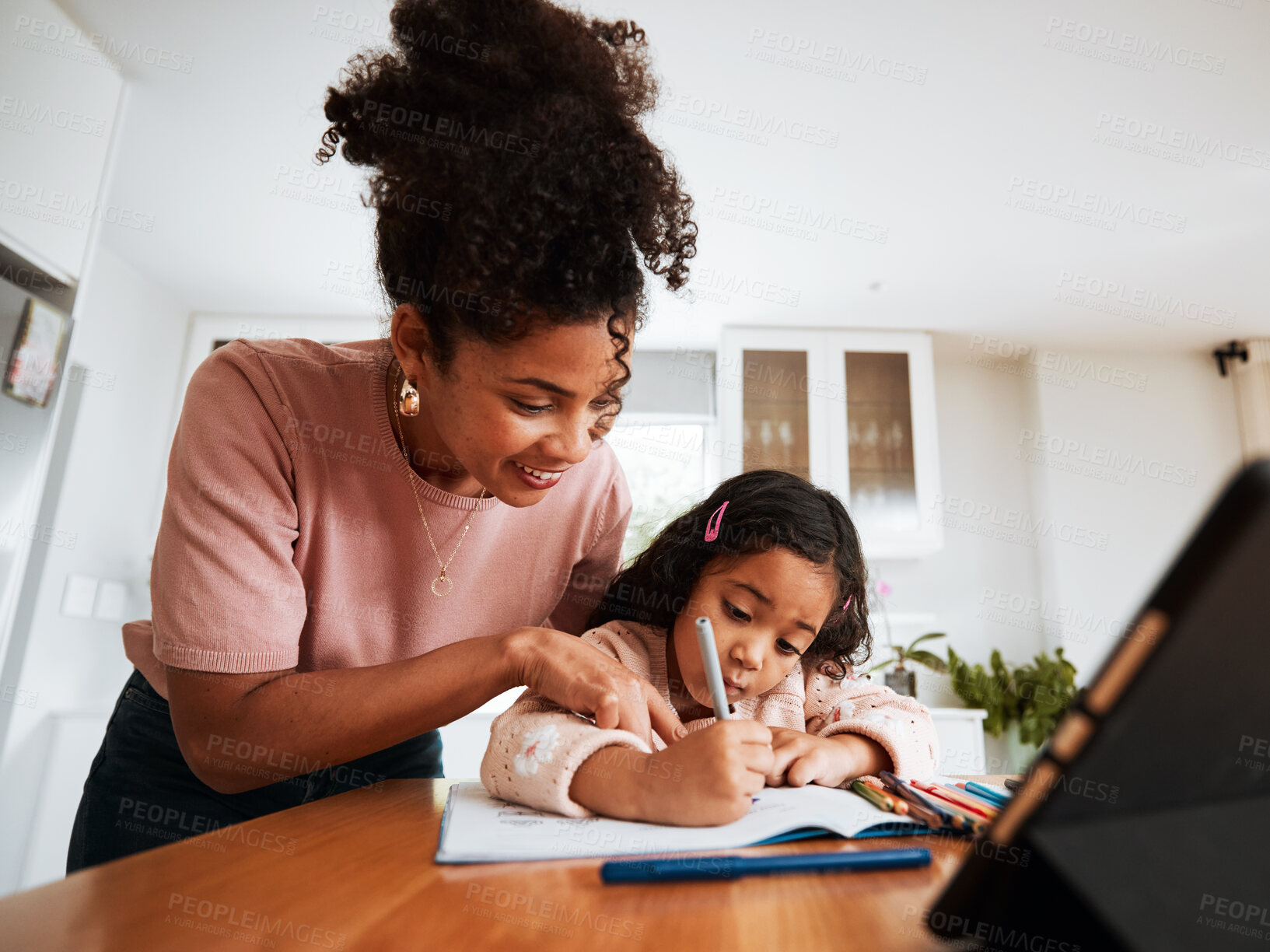 Buy stock photo Mother, child student and writing homework on a table at home for learning and development. African woman and a girl kid together for education, homeschool or drawing art with creativity and support