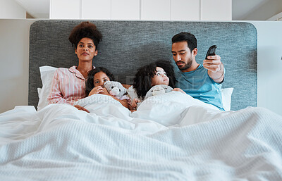 Buy stock photo Bed, relax or family watch television show, home subscription movie or streaming morning film broadcast. Remote control, bedroom child love or people watching tv, bonding or change channel to cartoon